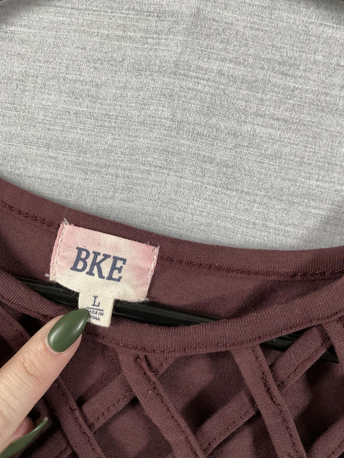 BKE Women's Short Sleeve Burgundy Lattice Neckline Shirt.