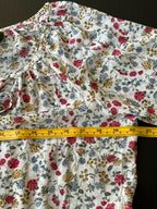 Suzanne Betro Women's 3/4 sleeve blouse in ivory with flower print. Size large 