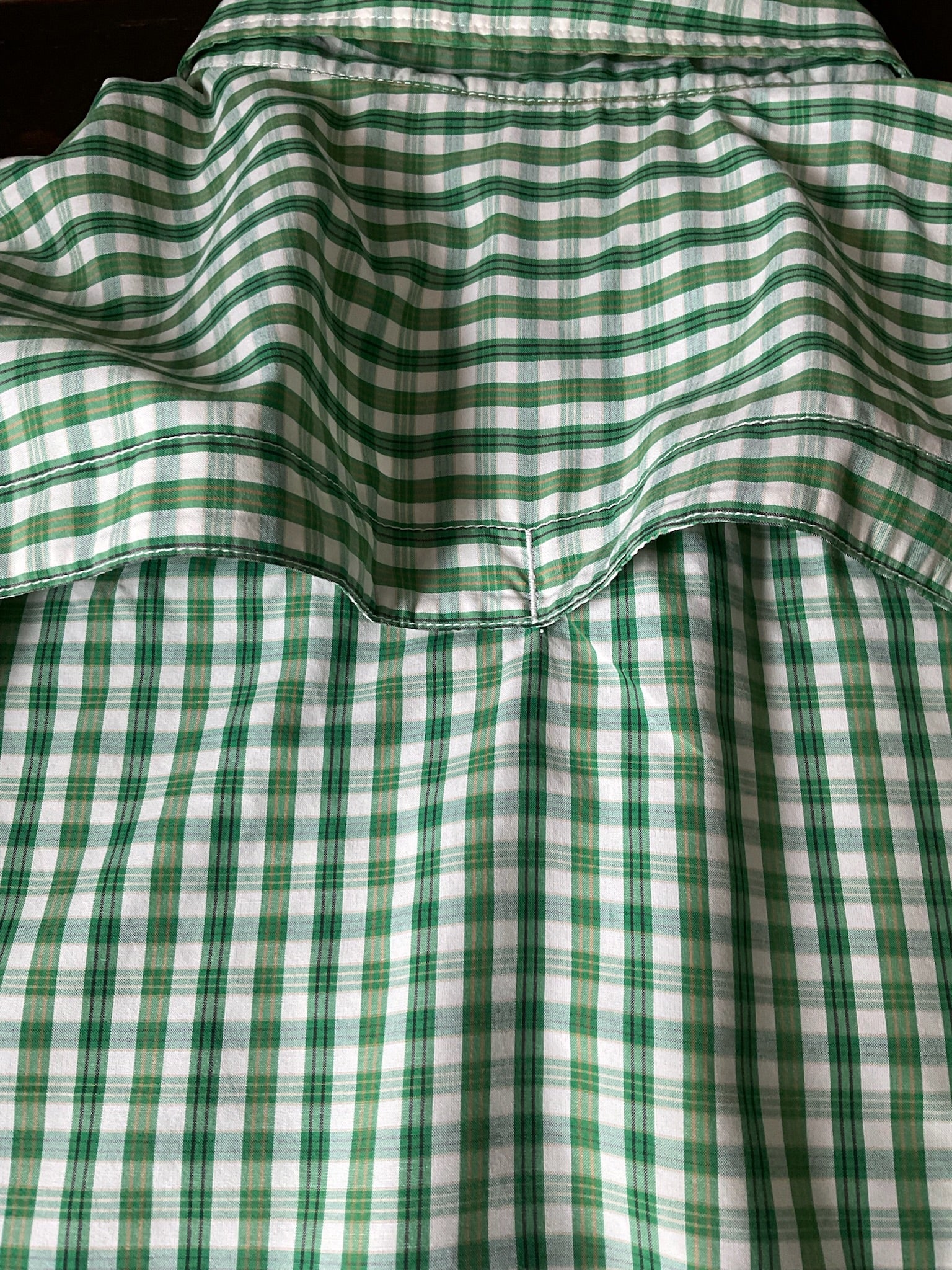 The North Face men's button-up long sleeve shirt Green Plaid. Size Medium