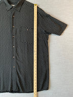 Covington Men's Short Sleeve Button Up Shirt in Black with White Diamond Print.