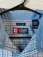 Blue checkered shirt with Chaps label on a hanger
