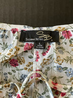 Suzanne Betro Women's 3/4 sleeve blouse in ivory with flower print. Size large 